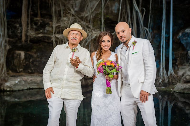 bride, father-in-law and groom with their boutonnieres at cenote wedding in yucatan