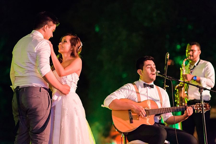 Happy Couple with guitar player at Hacienda Uayamon