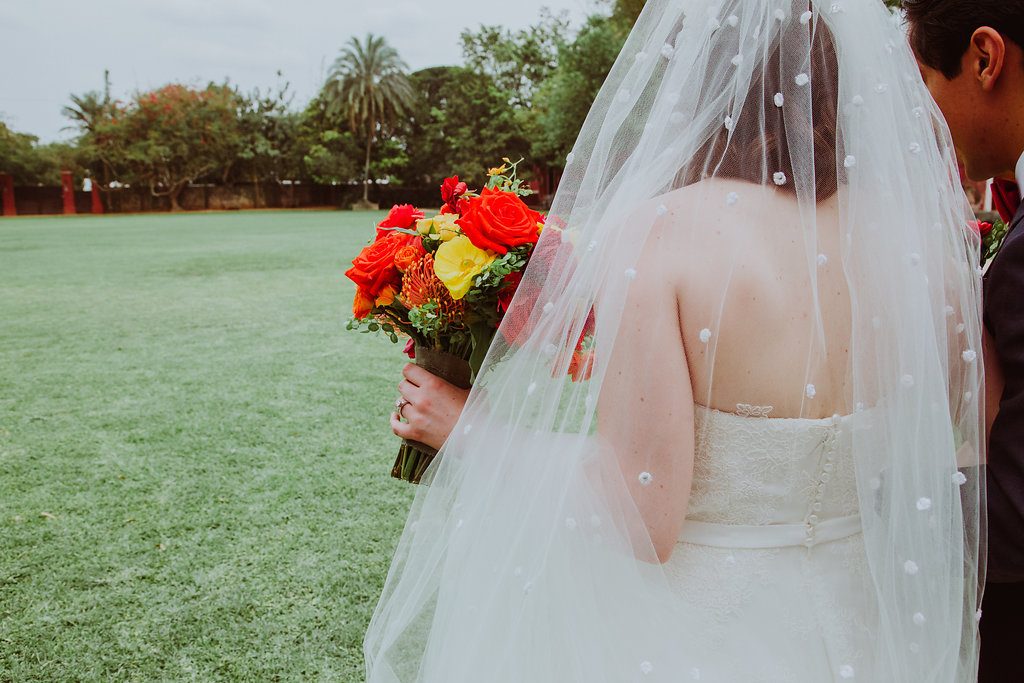 bride, groom and wedding bouquet at destination wedding