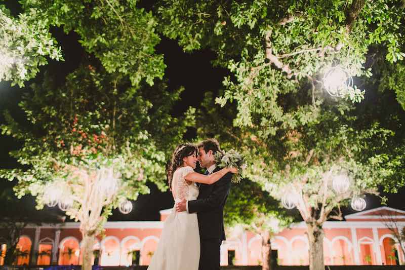 destination wedding kiss at hacienda chichi suarez in Yucatan
