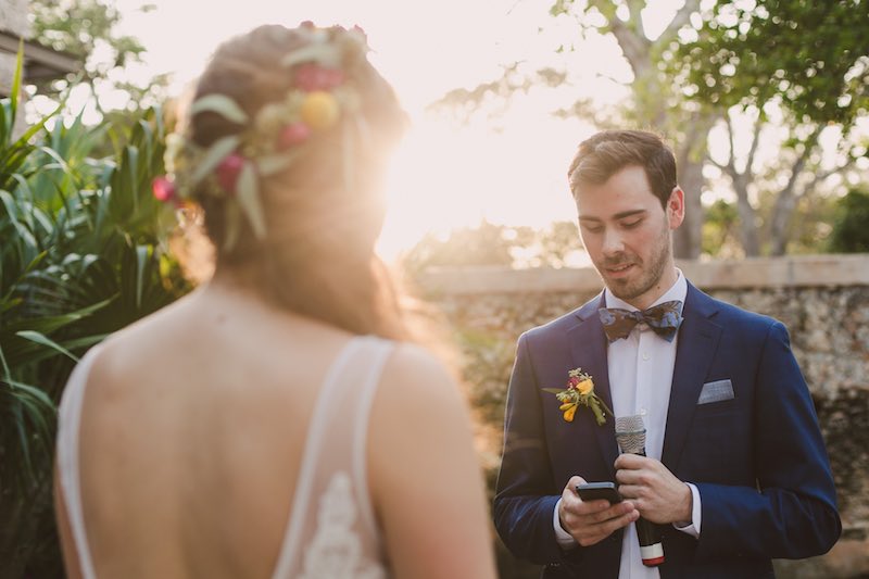 groom reading his vows at destination wedding in Yucatan