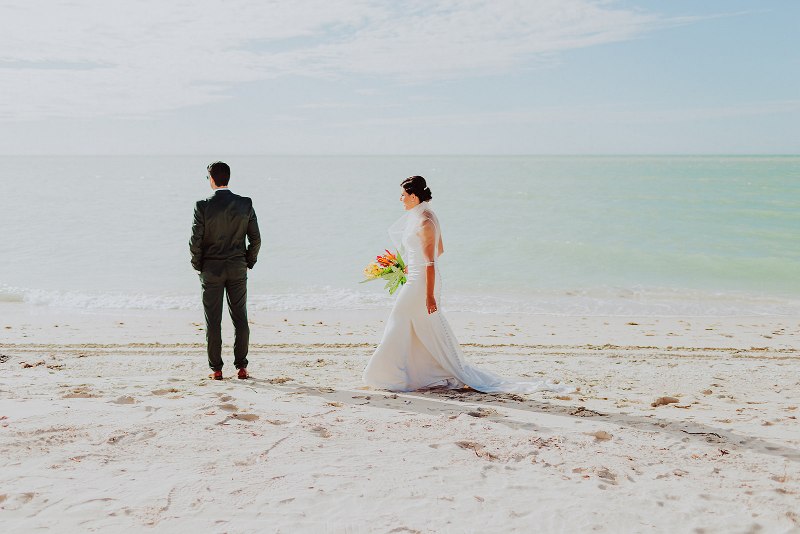 bride and groom wedding beach first look